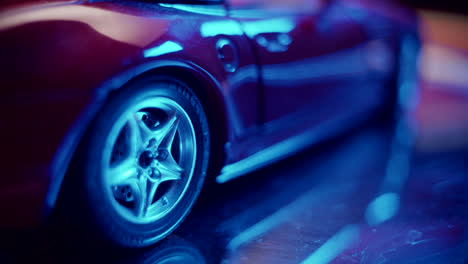 close-up of a model car with blue lighting