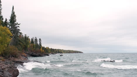 waves and splashing water on rocky lake superior shoreline