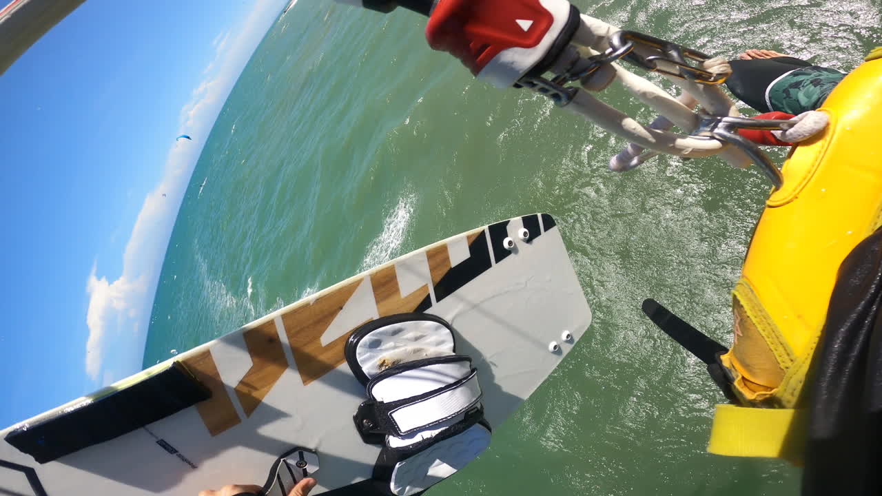 POV VERTICAL kite surfing in ocean water