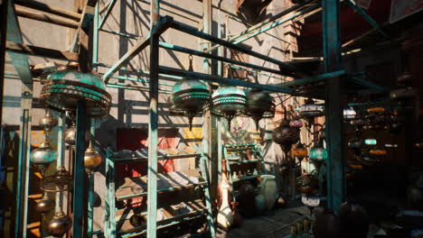 a shop in a middle eastern market with lamps and lanterns hanging from the ceiling