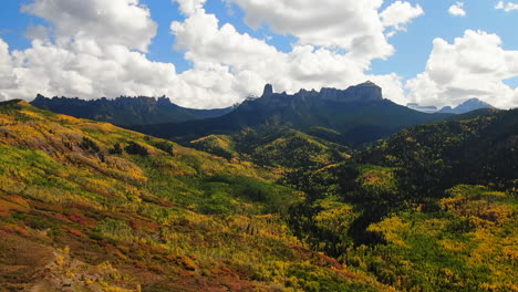 Cimmaron-Mount-Sniffels-Dallas-Range-Colorado-aerial-cinematic-drone-sunny-morning-autumn-fall-colors-San-Juans-Ridgway-Ralph-Lauren-Ranch-14er-Million-Dollar-Highway-Rocky-Mountains-upward-motion