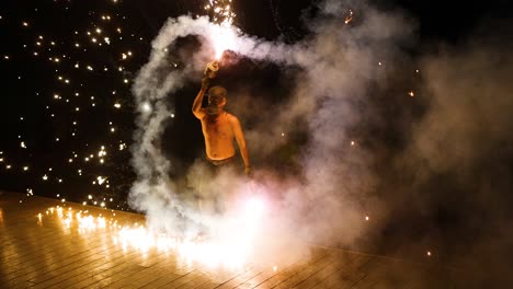 performer displays fire skills in krabi, thailand