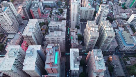 downtown santiago aerial view looking down at high rise residential district over population, chile neighbourhood