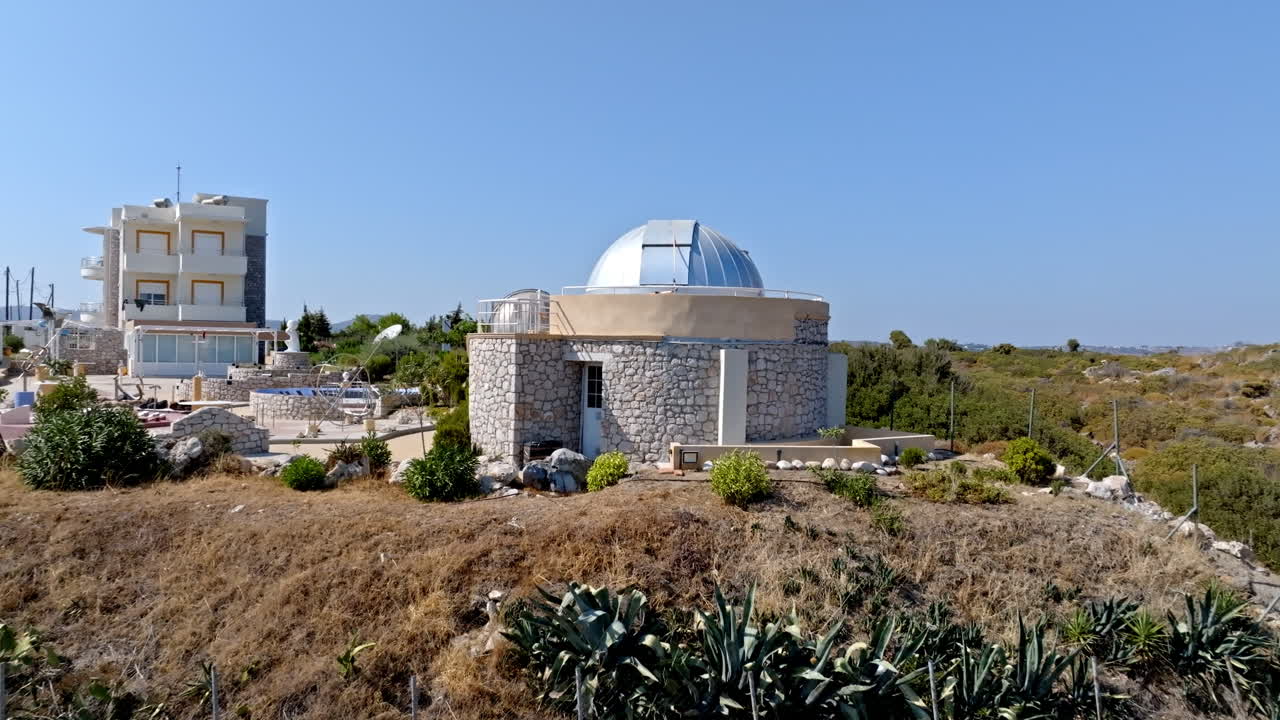 Aerial view approaching the Faliraki observatory, sunny day in Rhodes, Greece