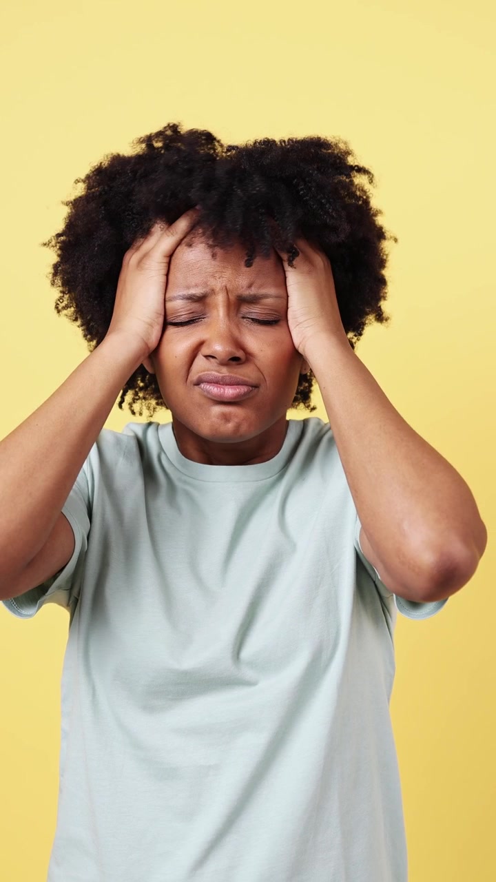 Young Black Woman Suffering from Headache or Stress
