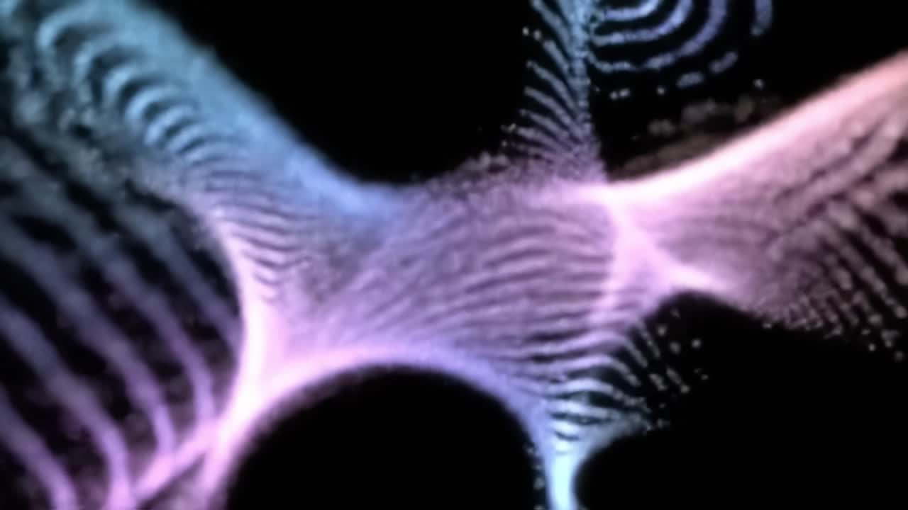 Vibrant light patterns flow and change color in a captivating display. This mesmerizing visual experience evokes a sense of movement and creativity, engaging viewers in a unique artistic journey.