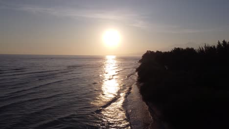 golden sunset over tropical ocean and beach