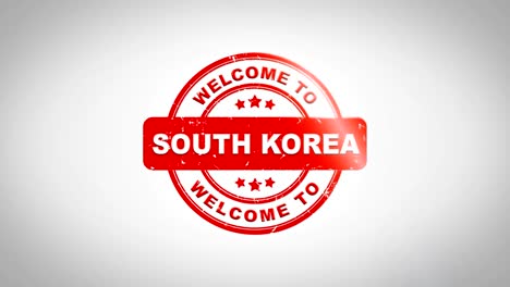 welcome to south korea signed stamping text wooden stamp animation. red ink on clean white paper surface background with green matte background included.
