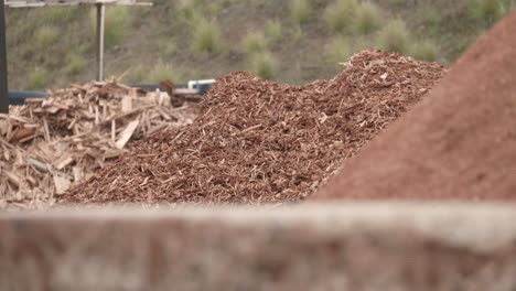 piles of wood, wood chip and sawdust, prepared recycled wood from construction industry