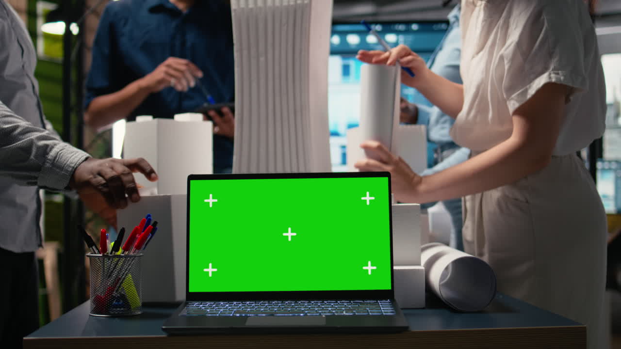 Diverse developers create construction master plan with copy space screen