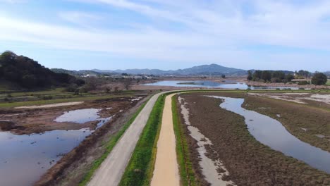 mesmerizing drone video of hiking trails near beautiful wetlands