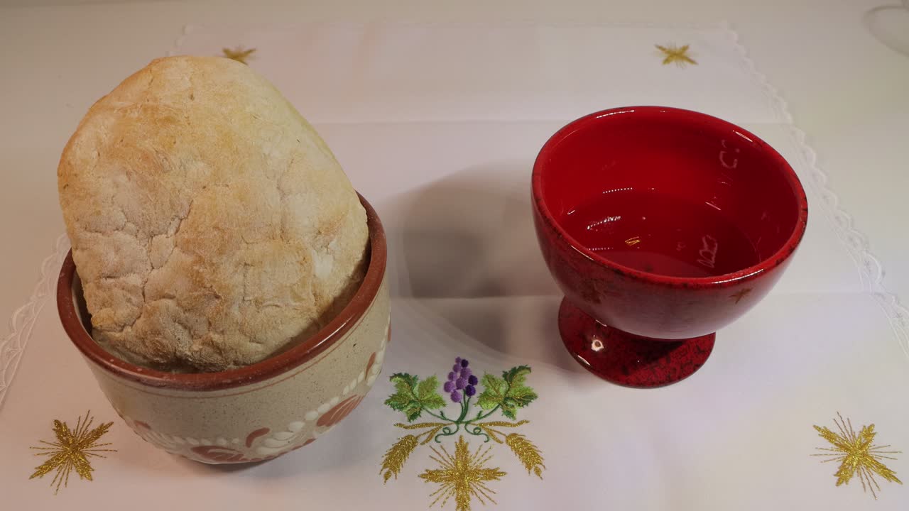 in the eucharist the love of jesus christ incarnate and transformed into bread and wine is presented from fraternity, community, love and hope. and the priest consecrates the hope