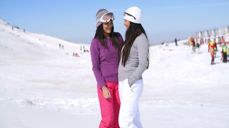 Two attractive women friends at a ski resort