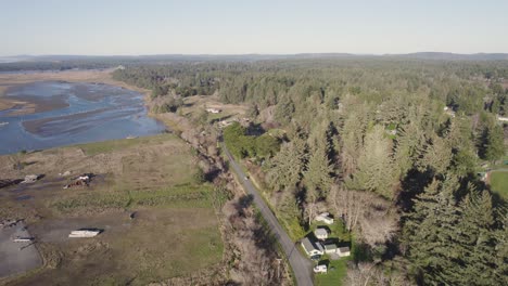 beautiful 4k aerial shot showcasing road and landscape in bandon, oregon