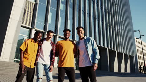 diverse group of friends laughing together outdoors