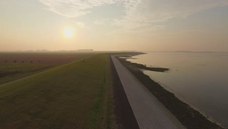 Aerial:-The-dykes-and-shoreline-of-the-Oosterschelde,-the-Netherlands