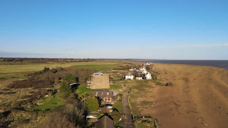 aerial footage house convert from martello tower small defensive fort shingle street suffolk uk