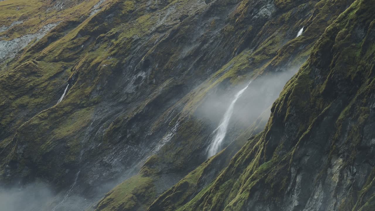 Waterfall in Rugged Mountain Scenery, Dramatic Rocky Mountains and Big Waterfalls Falling Down Mountain in Himalayas in Nepal