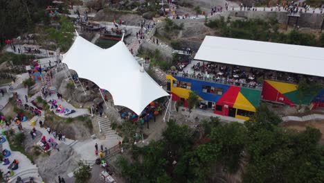 people are traveling at obelix hills, one of the favorite tourist destinations in yogyakarta in 2021