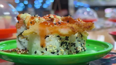sushi being served in a restaurant