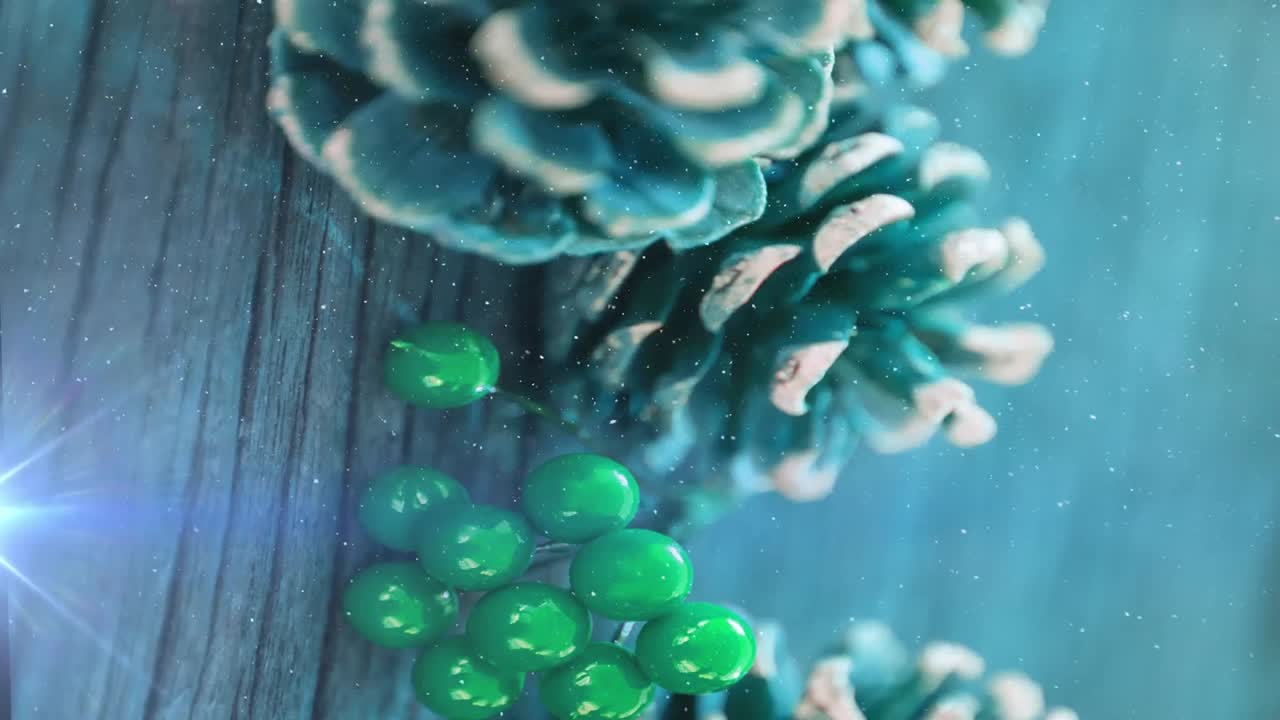 animación de senderos de luz y nieve cayendo sobre decoraciones navideñas sobre fondo de madera