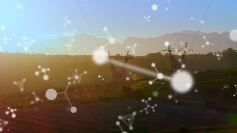 Animation-of-molecules-over-electric-pylons-and-countryside