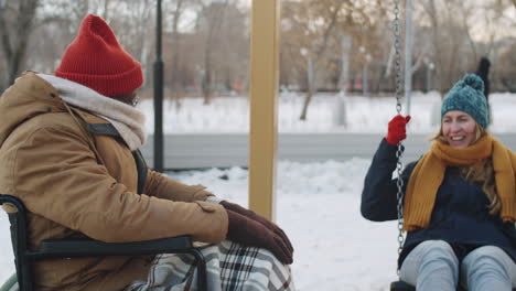 friends enjoying a winter day in the park