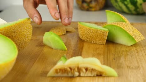 precision slicing is used to take the hard skin off of galia melon chunks