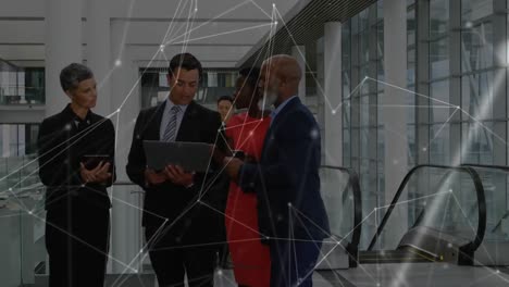 Web of connections against people working in an office