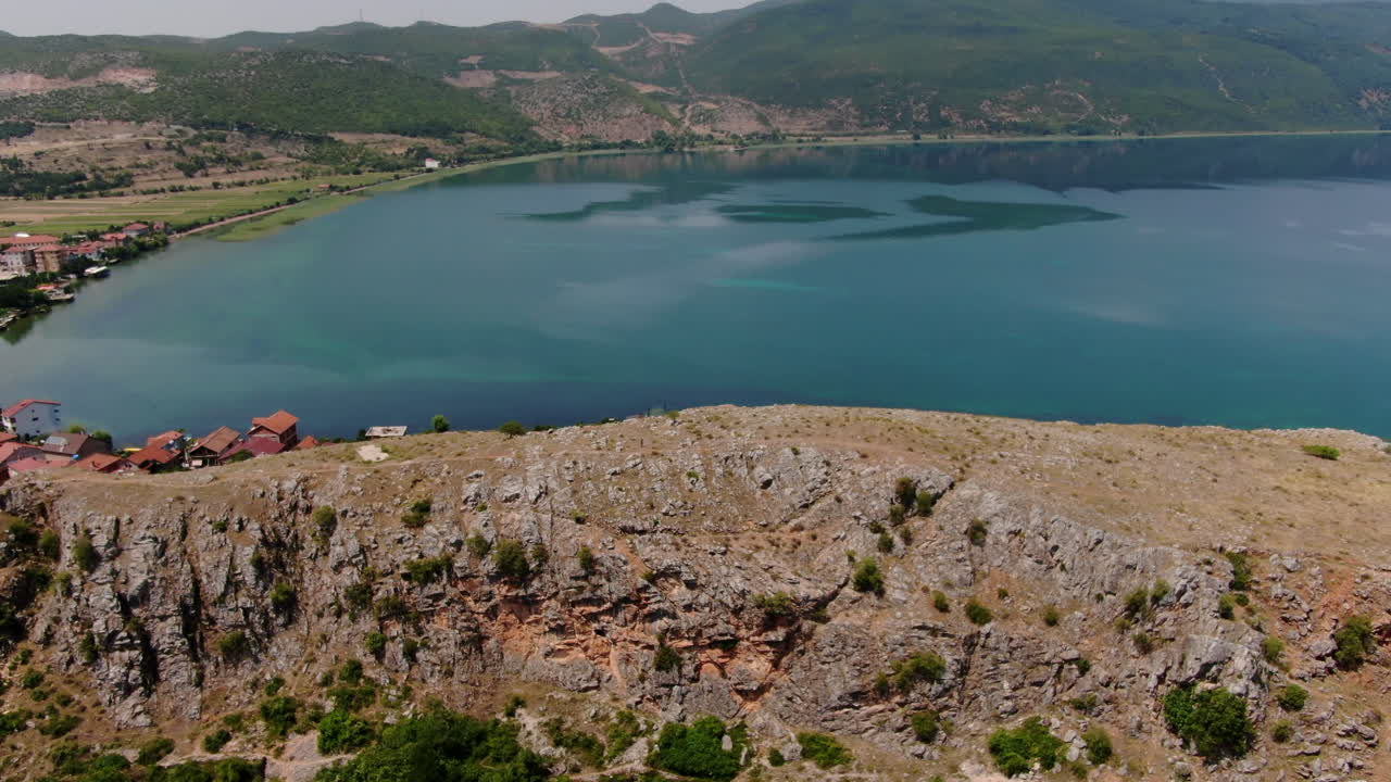 Aerial dolly out - Lin Peninsula and village on Lake Ohrid, Albania