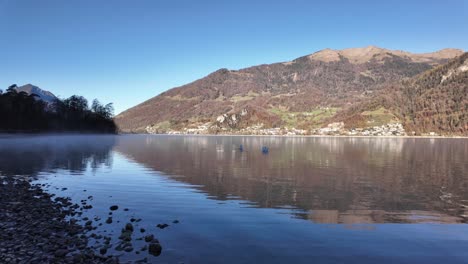 walensee lake walen calm water surface alpine swiss mountains landscape europe