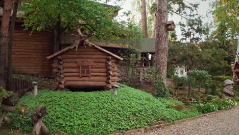 rustic wooden house in a garden setting