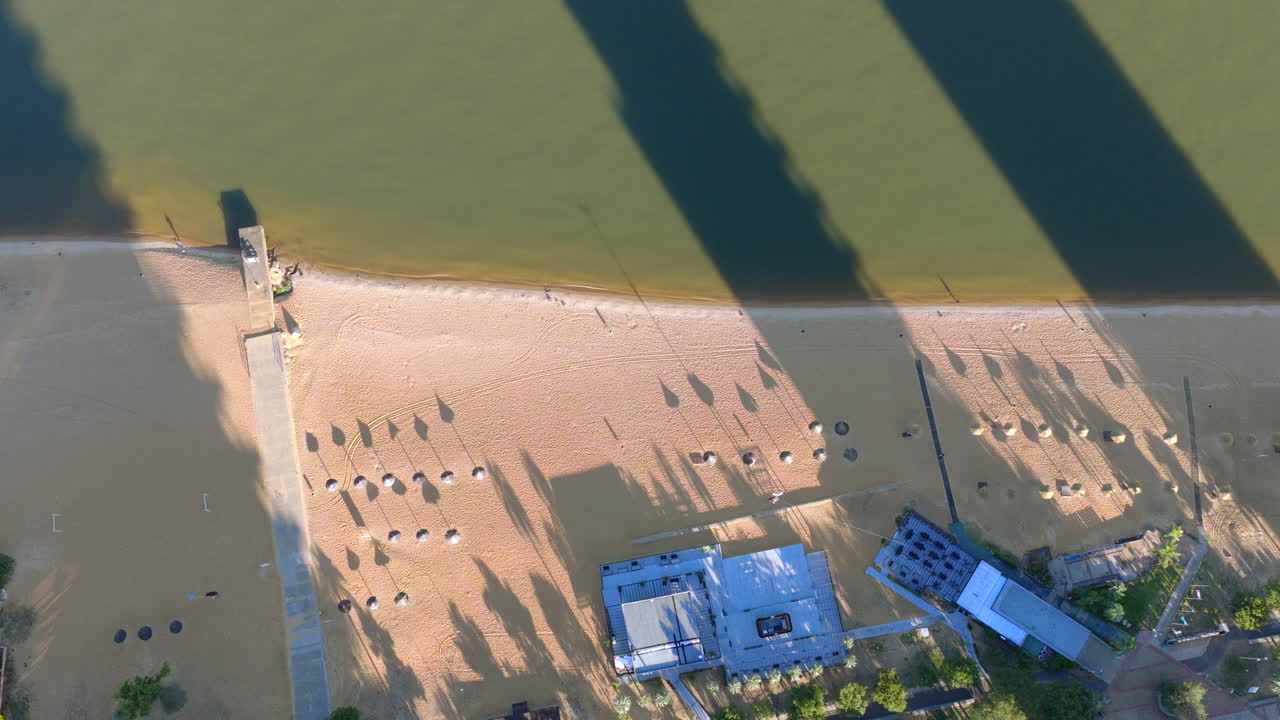 Drone aerial view of Corrientes Costanera beachfront with residential and commercial development projects