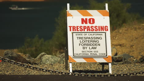 no trespassing sign on a warm sunny day near oroville dam in california