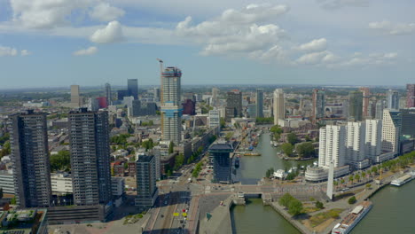 Circling-drone-shot-of-Rotterdam-Maritime-district