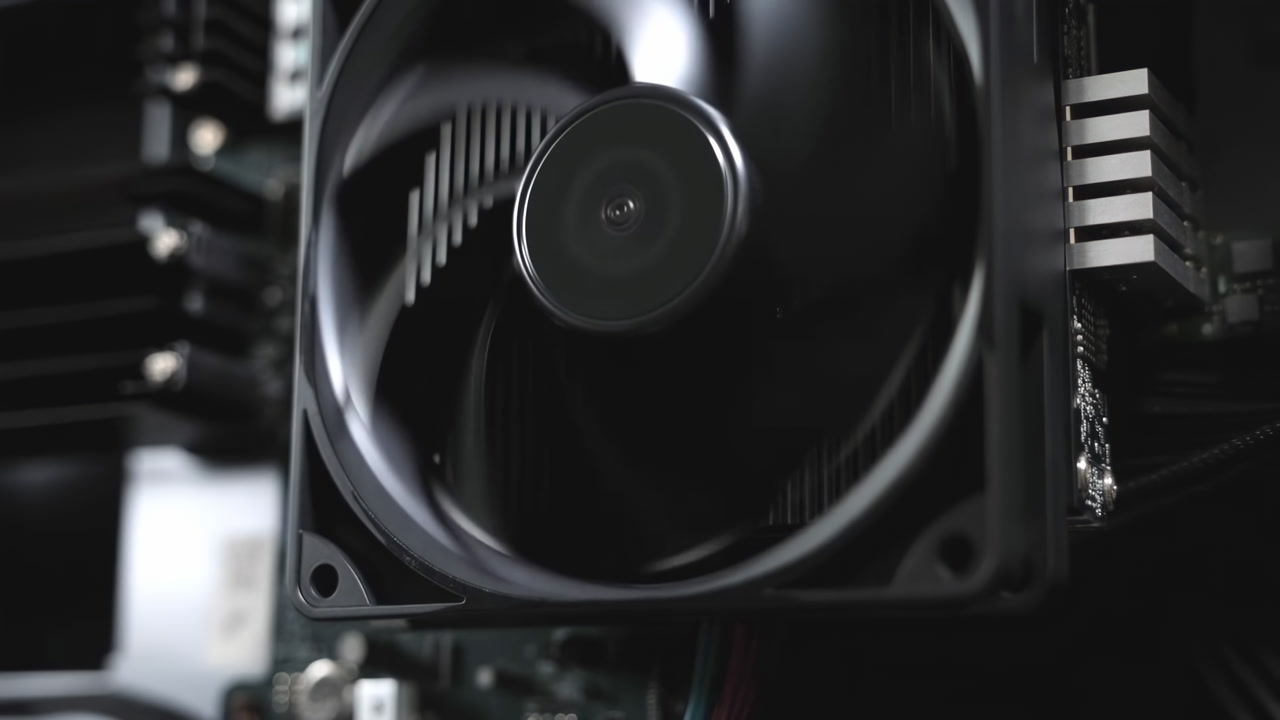 Closeup Pc Cooling Fan Spinning, Moody Studio Lighting Highlights Black Blades Rotating Near Heatsink