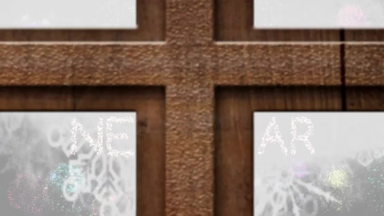 창문을 통해 볼 수 있는 새해 이브의 애니메이션