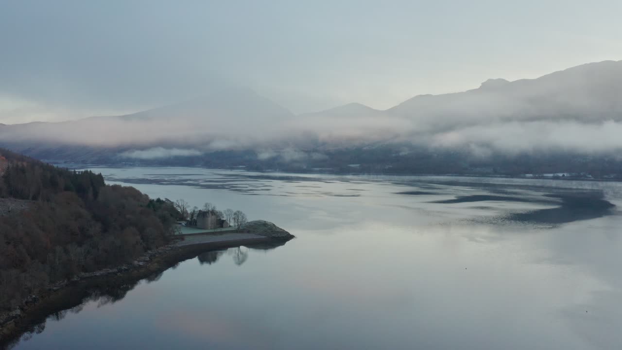 The Vast And Serene Waters Of Loch Fyne On A Foggy Weather Located Inside The Trossachs National Park In Highlands of Scotland. -aerial shot