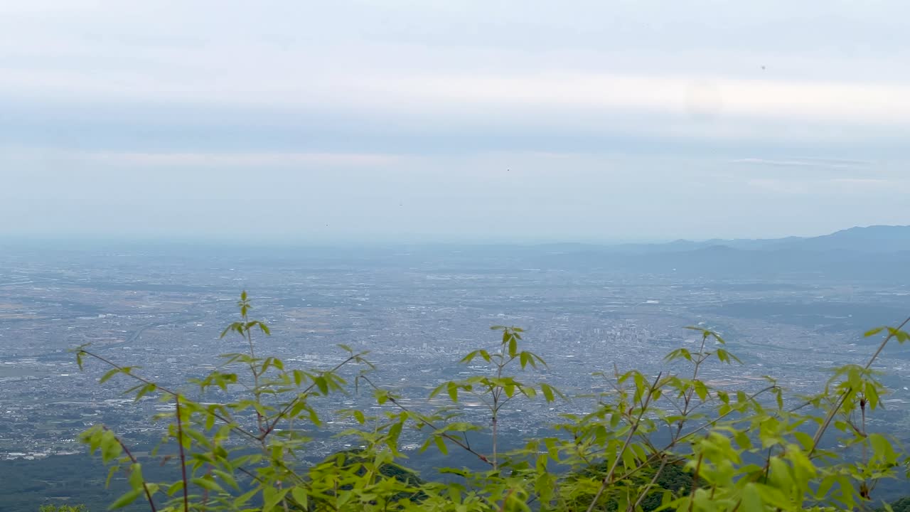 High above view over Kanto plain in Gunma prefecture, Japan, in slow motion