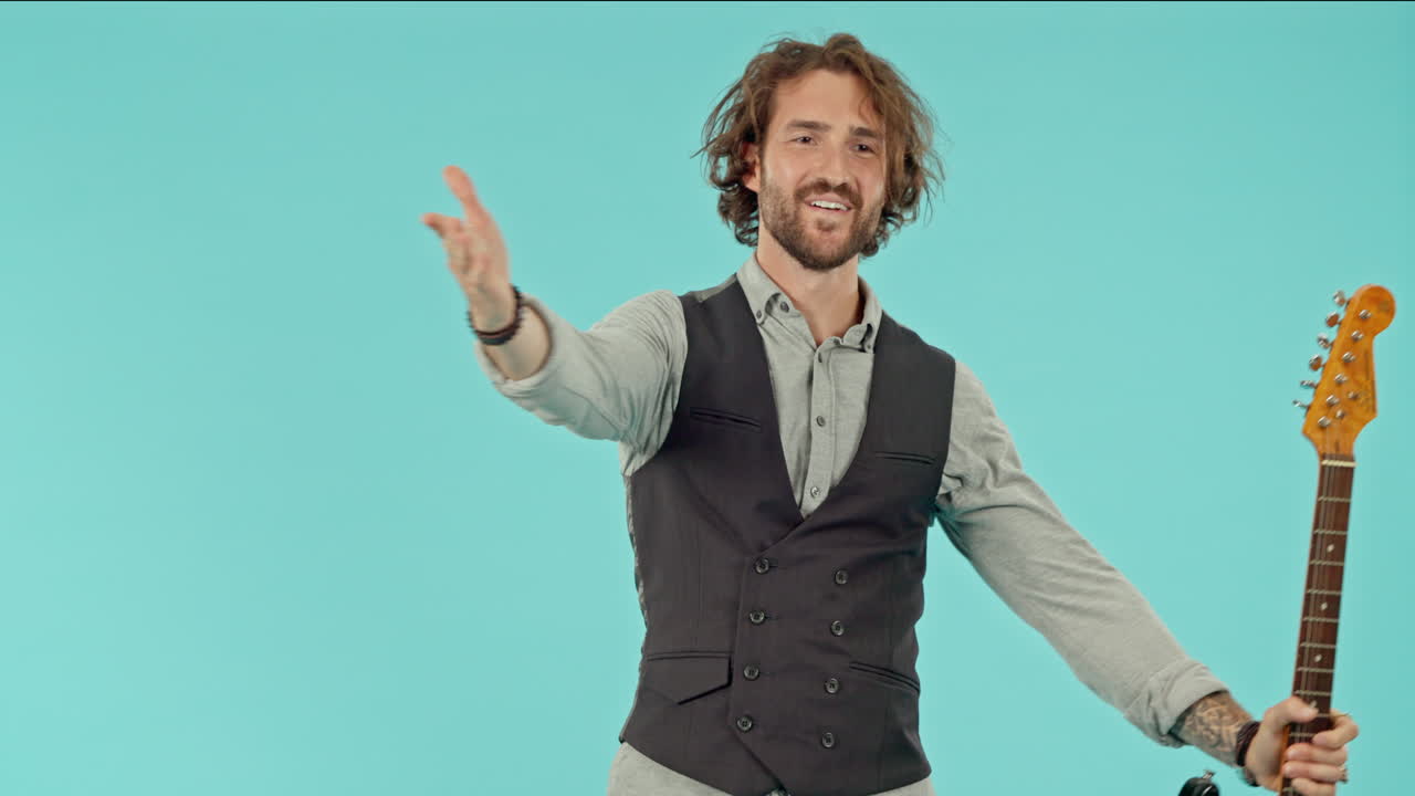 rock, actuación y cara de un hombre con una guitarra