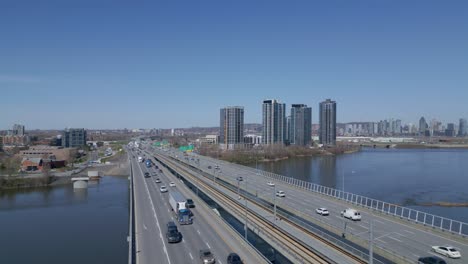 Construction of residential towers on Island of Nuns seen from vehicular bridge