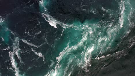 waves of water of the river and the sea meet each other during high tide and low tide.