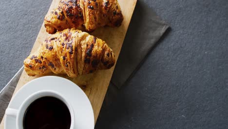 Video-of-close-up-of-croissants-on-gray-background