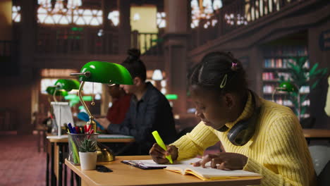 student studying in a library