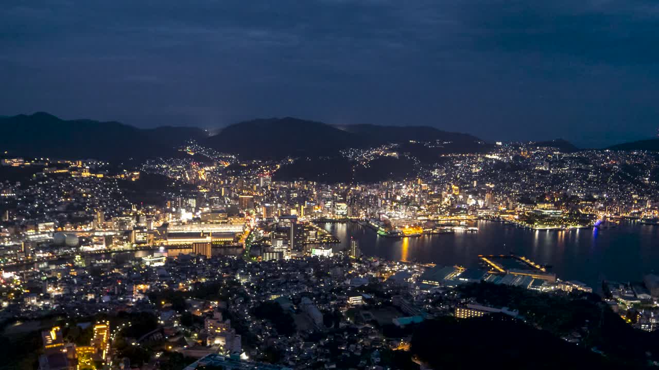 Beautiful day to night timelapse over Nagasaki City Bay from panorama