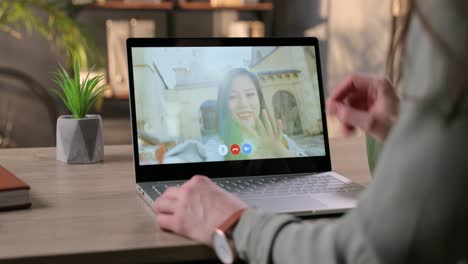 Woman-Having-Video-Conversation-With-Pretty-Happy-Girl-While-Sitting-At-Desk-Indoor