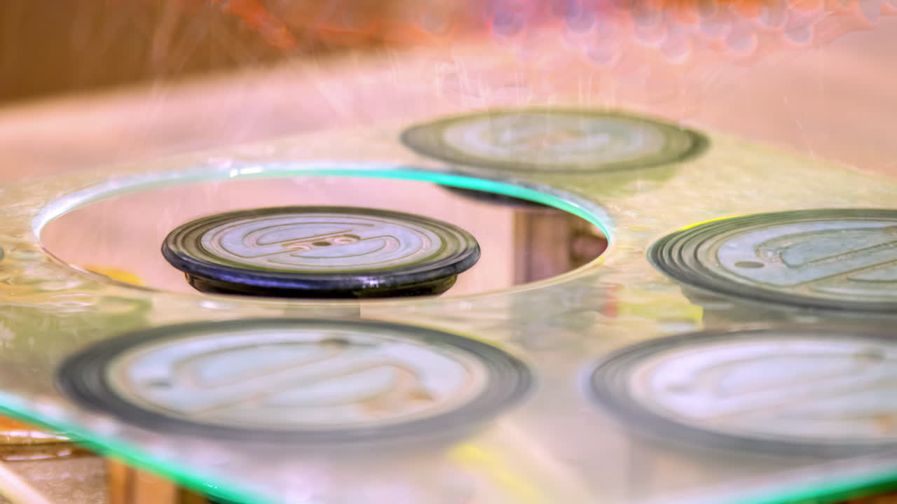 Time-lapse of machine cutting glass with a laser