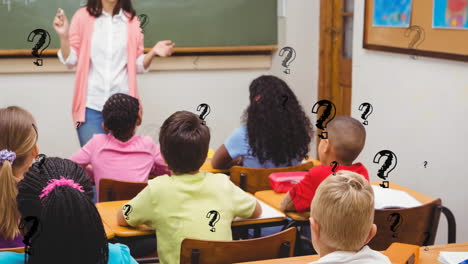 animation of question mark symbols against caucasian female teacher teaching students at school