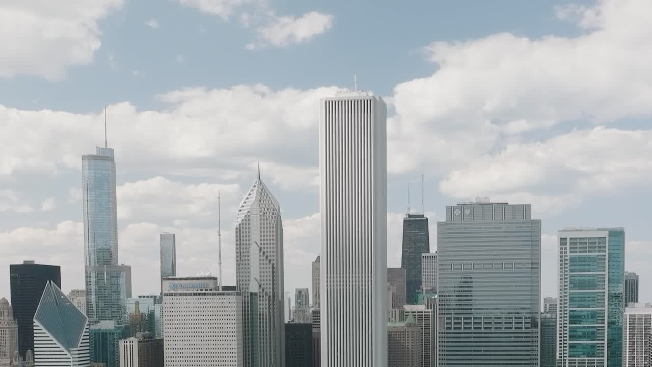 View of Chicago downtown skyline with tall buildings and clouds above