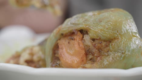 close-up of stuffed green peppers